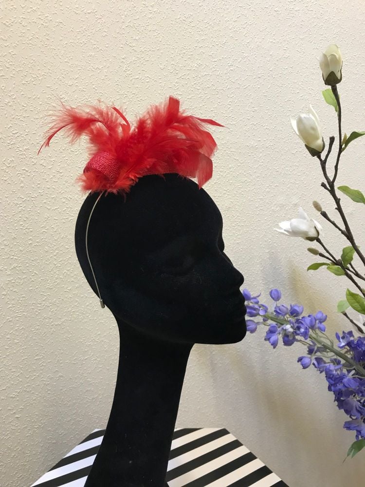 Red wrap over fascinator