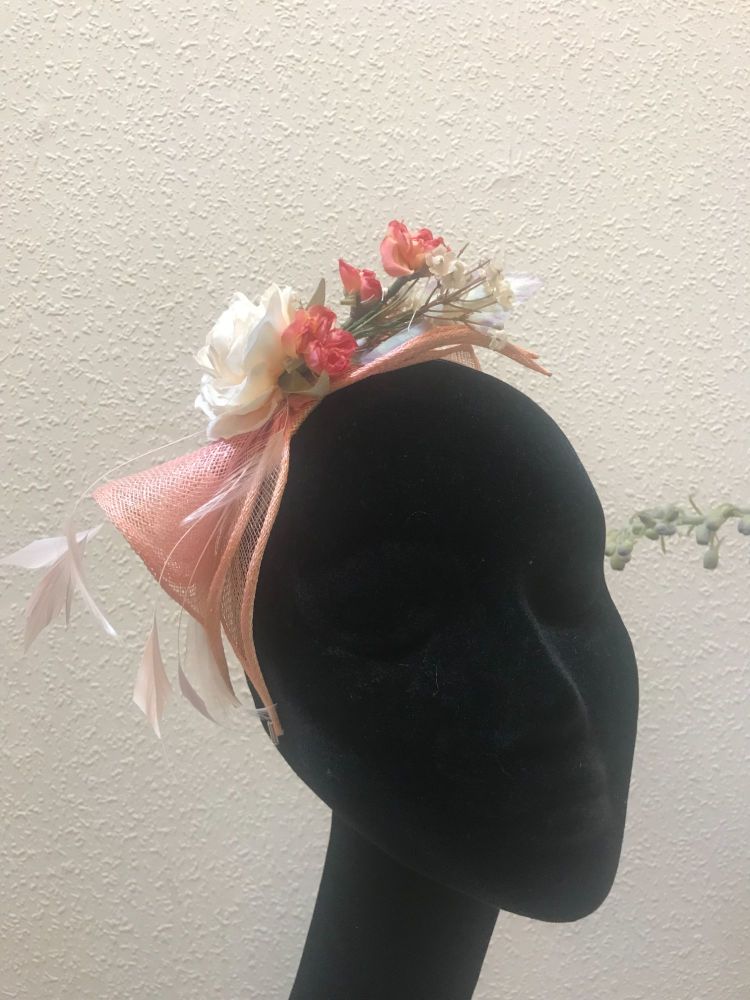 Pink and peach fascinator front