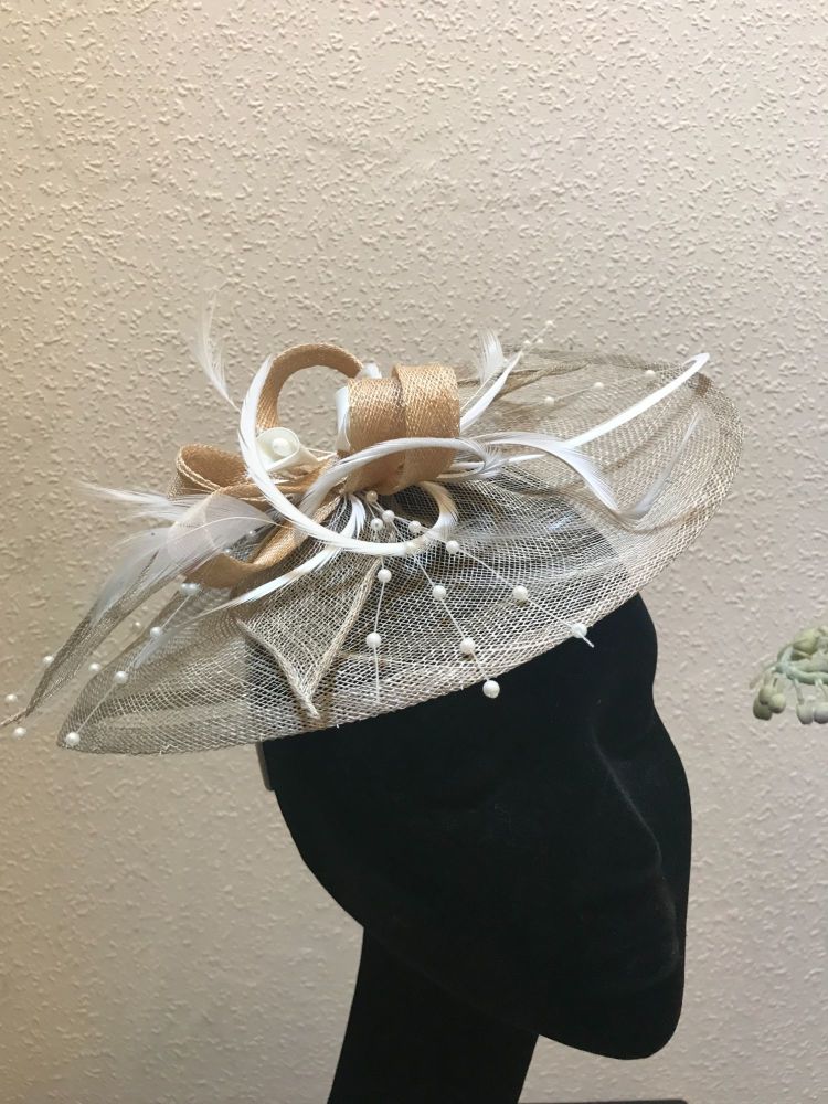 Taupe fascinator with net