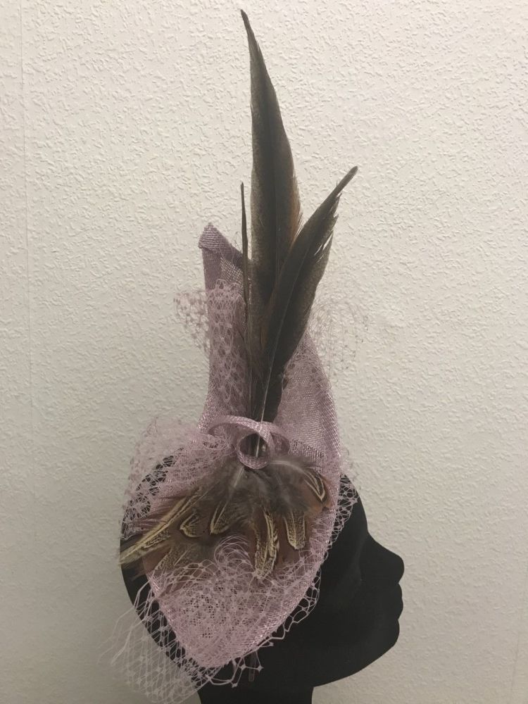 Unique fascinator with pheasant feathers and net