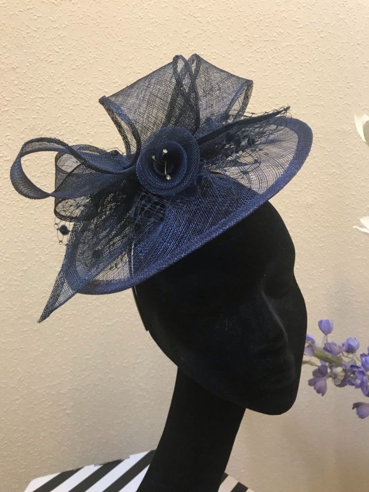 Unique navy fascinator with navy sinamay & net decoration