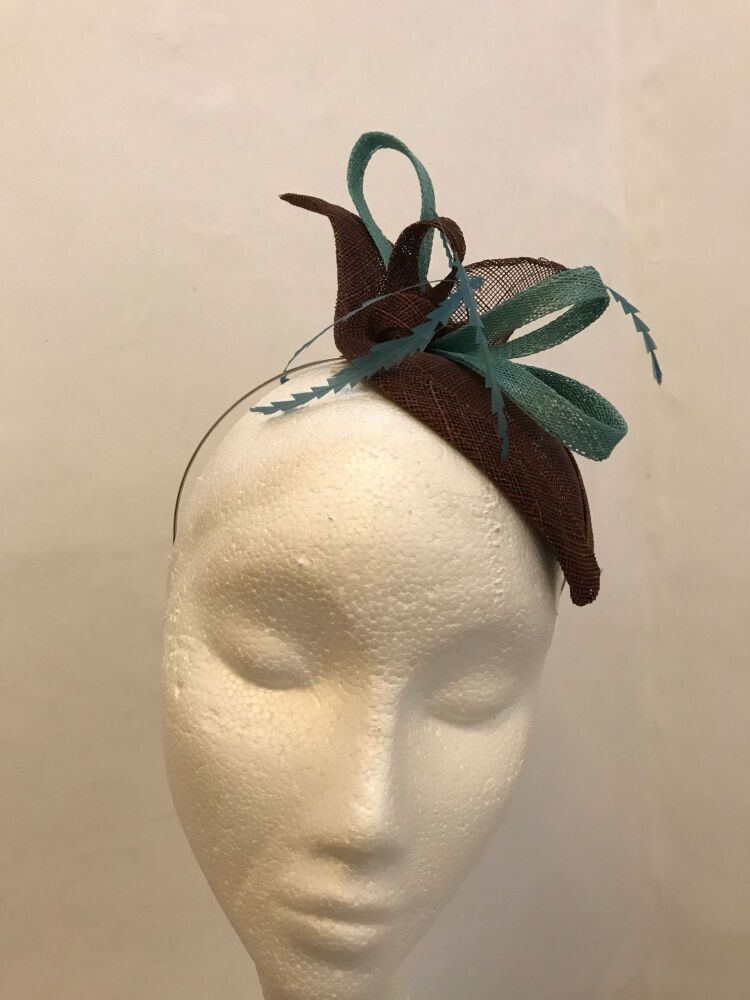Brown and blue fascinator from the front