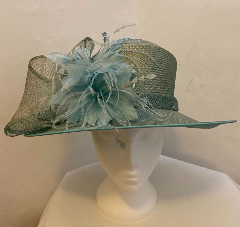 Large pale green hat with flat brim