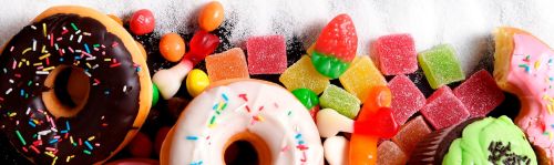mix-of-sweet-cakes,-donuts-and-candy-with-sugar-text-000065773187_Large