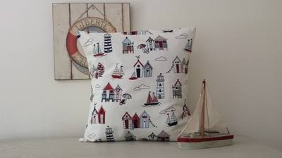 'Happy Days' Cream Fabric Cushion Cover With Red & Blue Beach Huts
