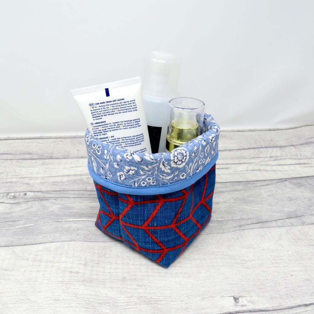 Small blue fabric storage bin