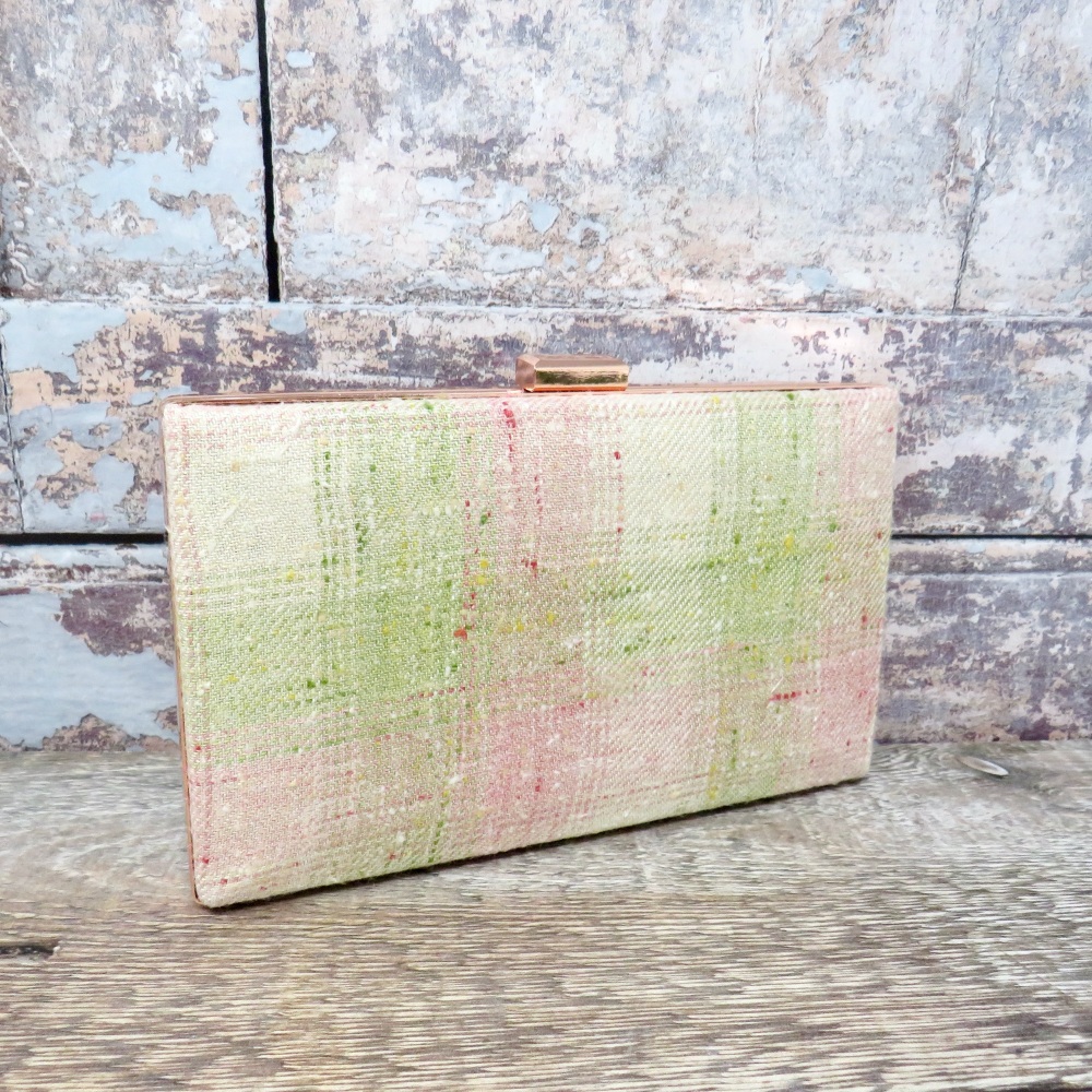 Pink and green minaudière clutch