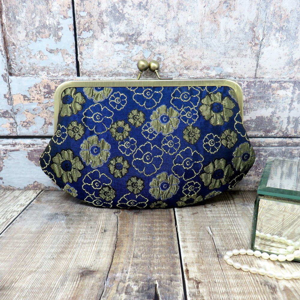Navy and gold brocade clutch