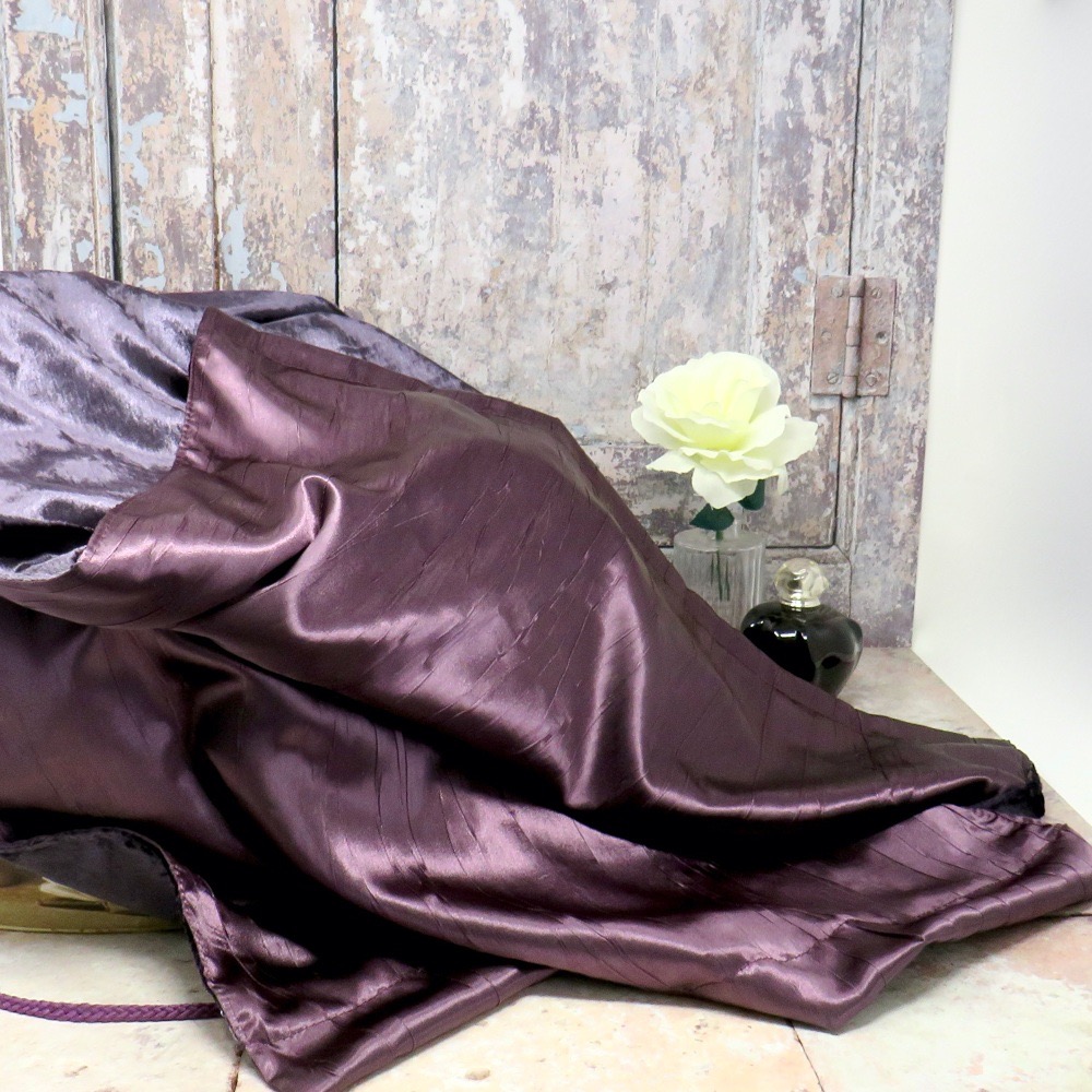 A luxurious dusky rose velvet wrap with a satin lining.