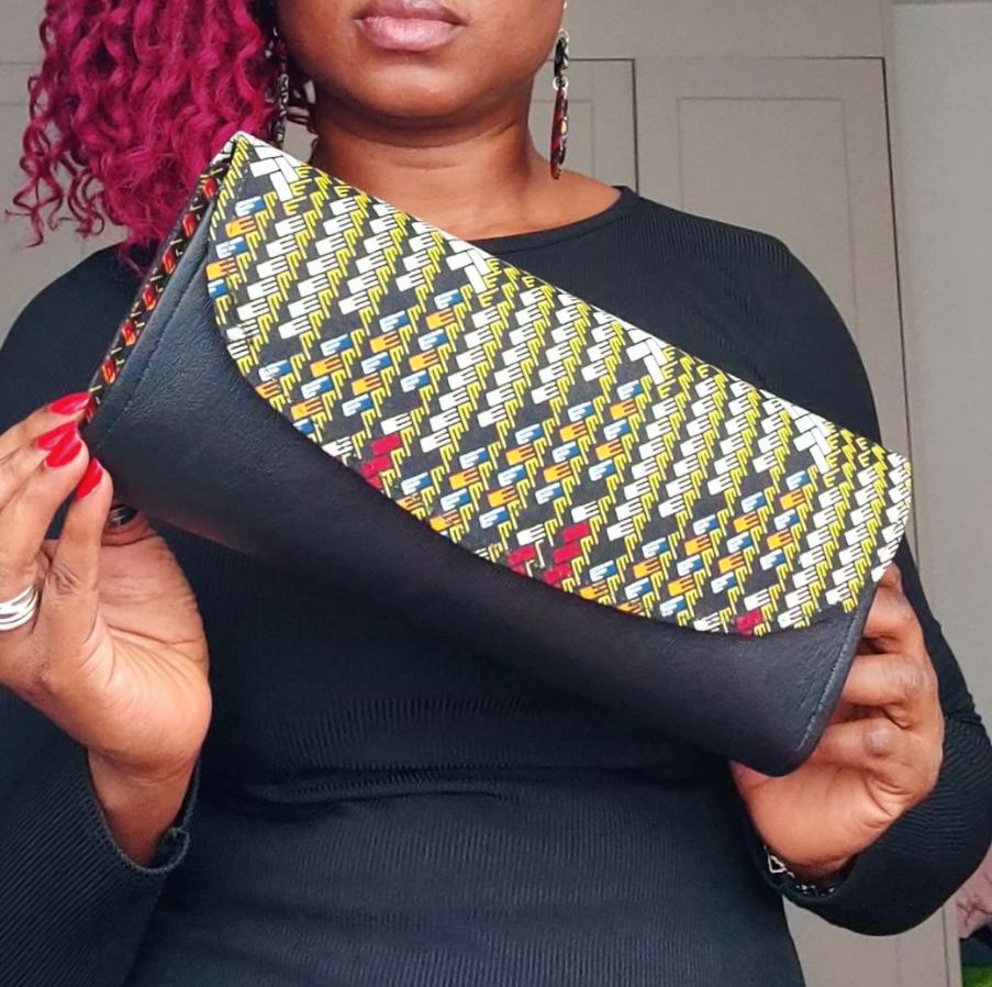 Ketepa Print and Faux Leather Clutch Bag  