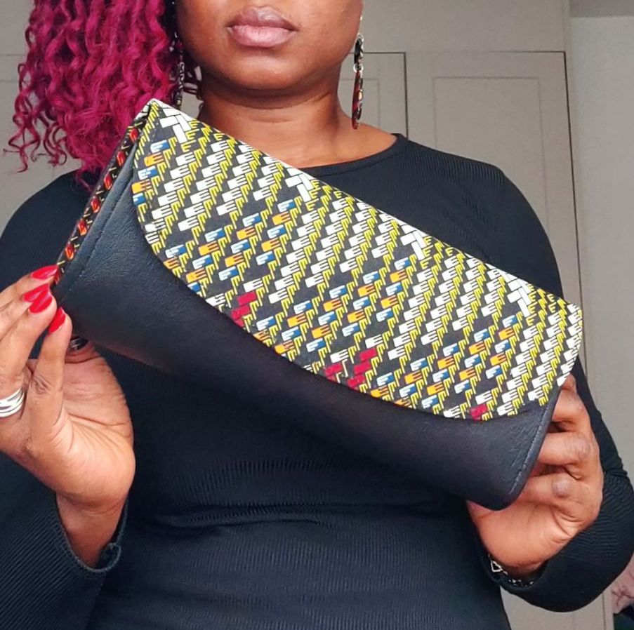 Ketepa Print and Faux Leather Clutch Bag  