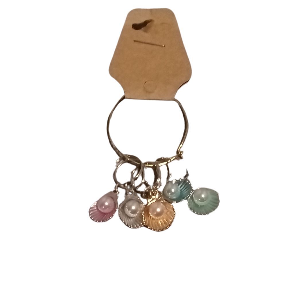 53 On/over the needle marker - shells with beads in