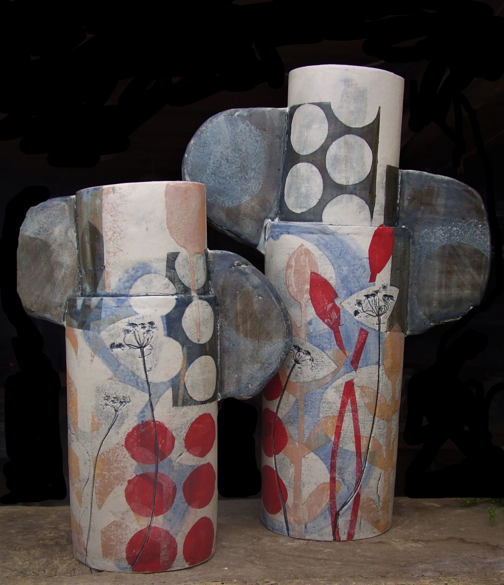 2 large red totems with spots