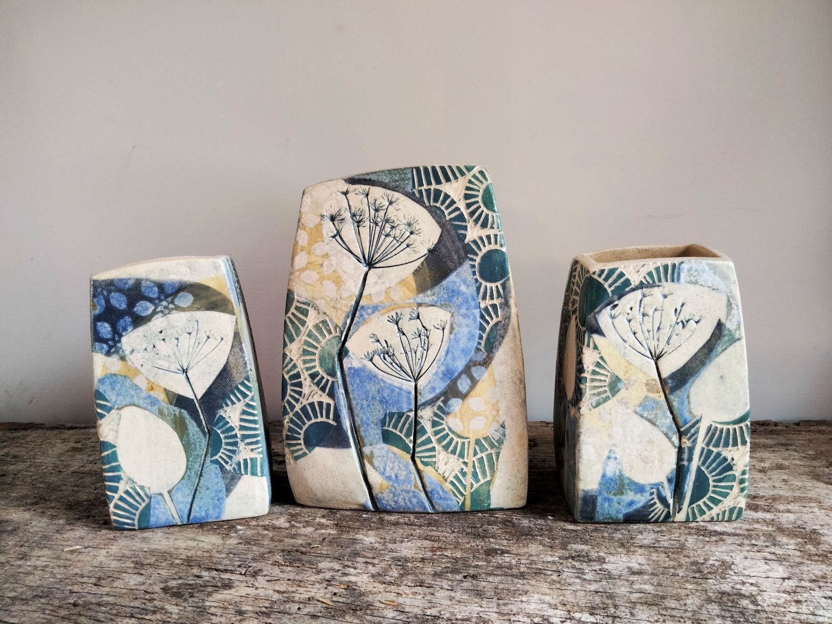 3 blue, green and gold vases