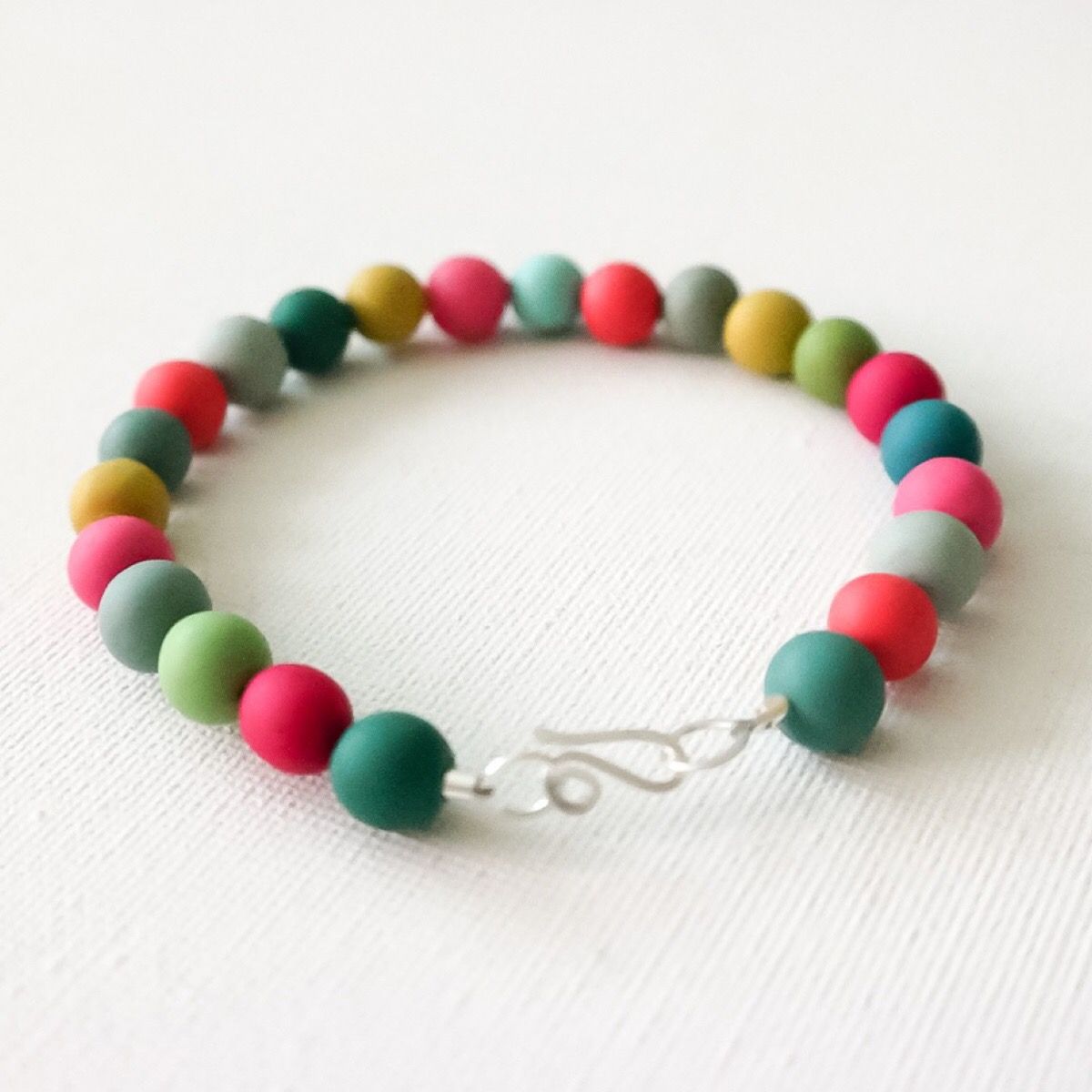 multi coloured bead bracelet Colour Desings