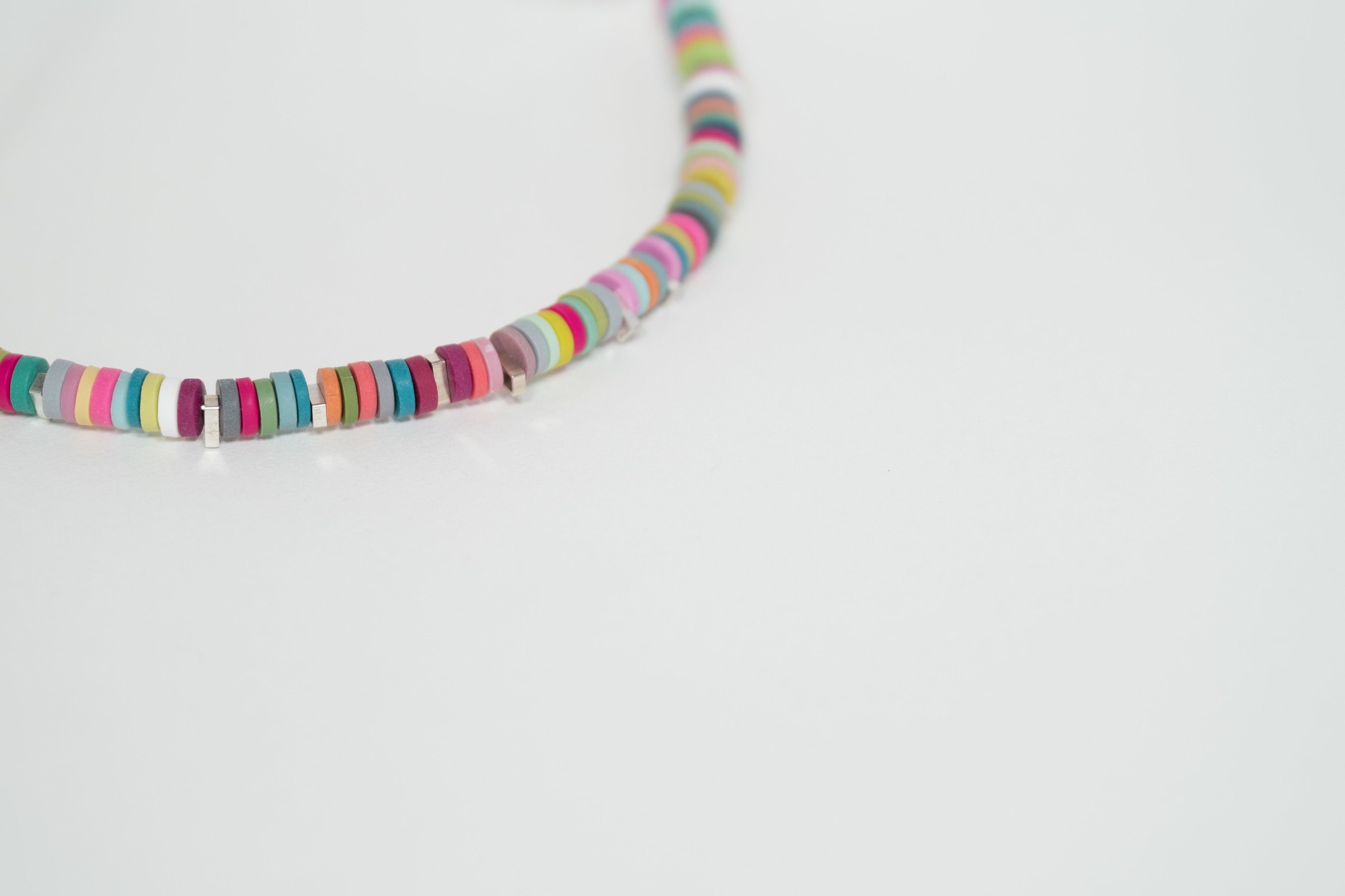 Multi coloured tiny disc polymer clay necklace by Colour Designs Jewellery