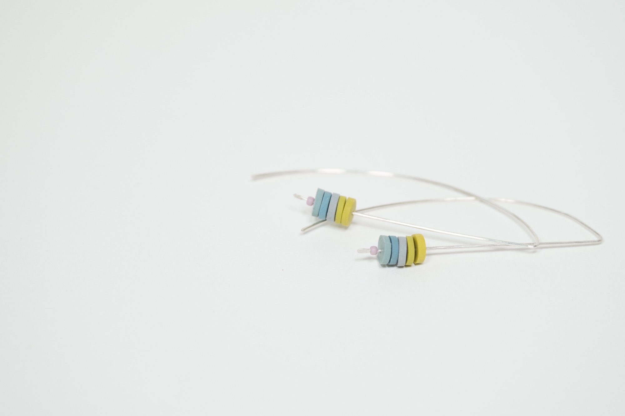 Recycled sterling silver long wire earrings with mustard and grey blue disc beads by Colour Designs Jewellery