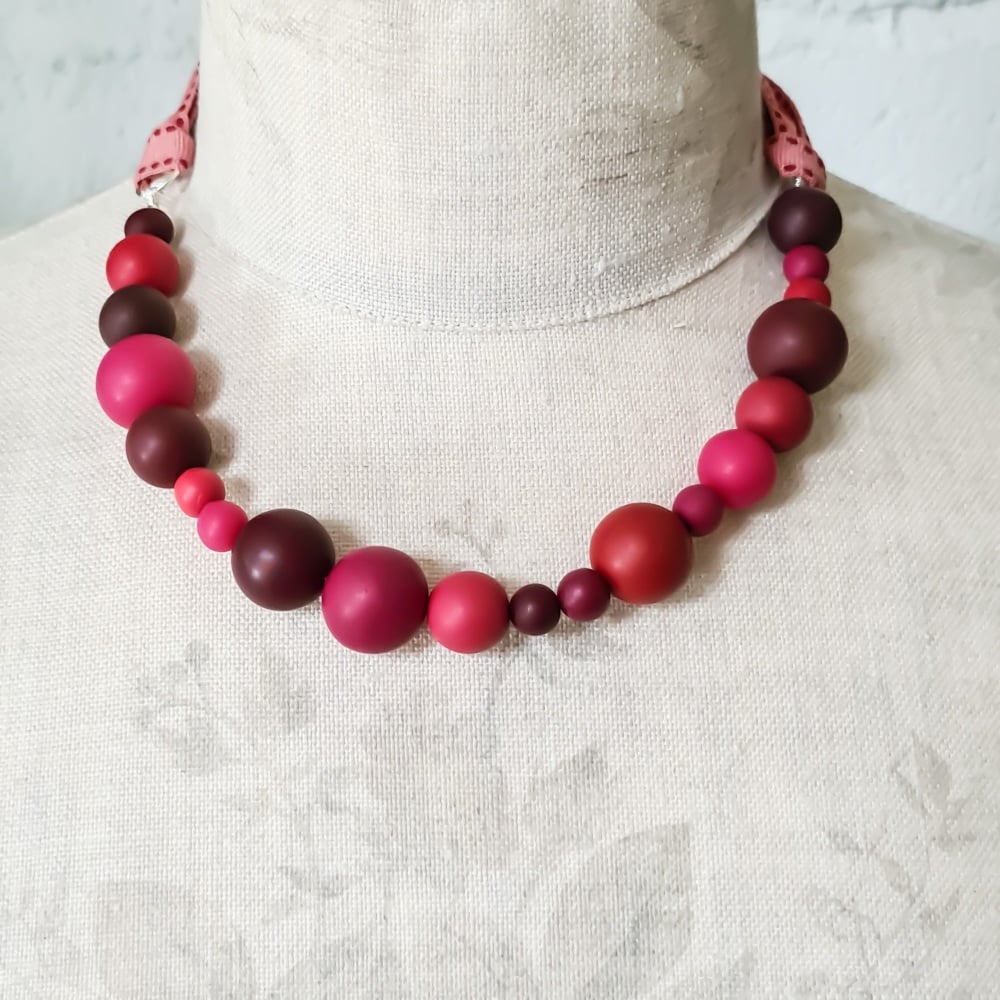 Random Bead Necklace with Ribbon Ties in Reds and Pinks