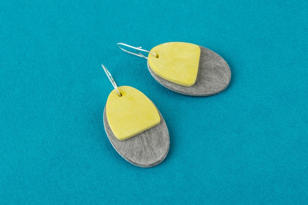 Statement polymer clay earrings in charcoal and olive green handmade by Clare Lloyd Jewellery