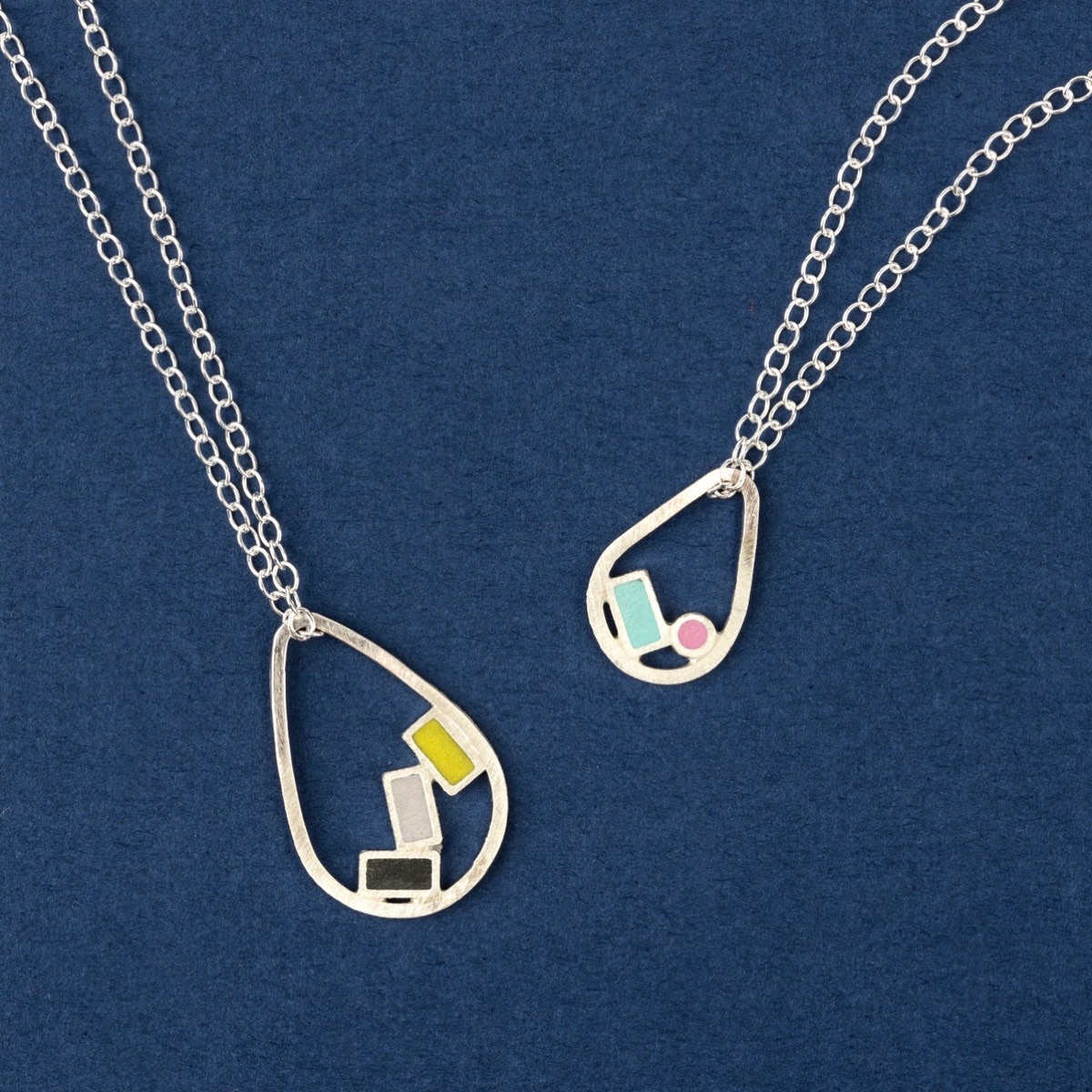 Contemporary Handmade silver and resin teardrop pendants by Colour Designs Jewellery
