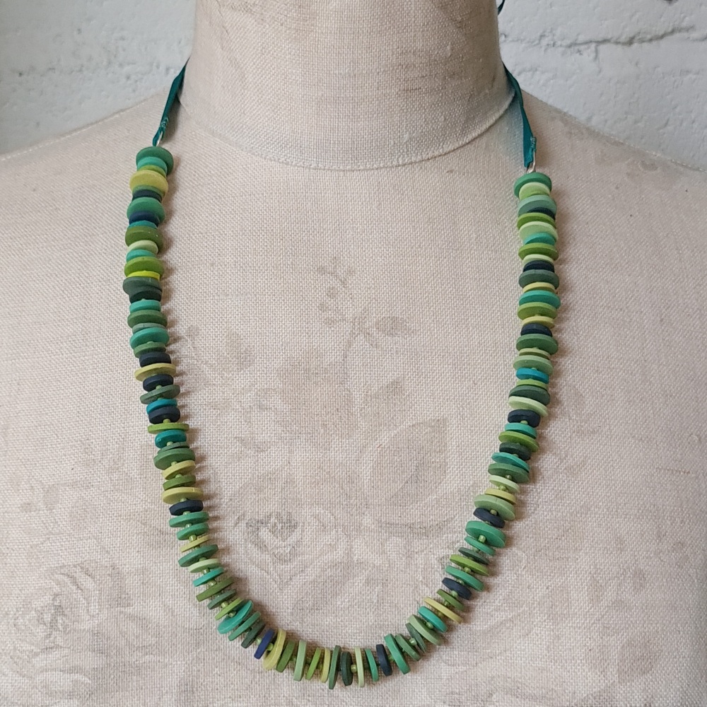 Ribbon Tie Disc necklace in greens and navy blues