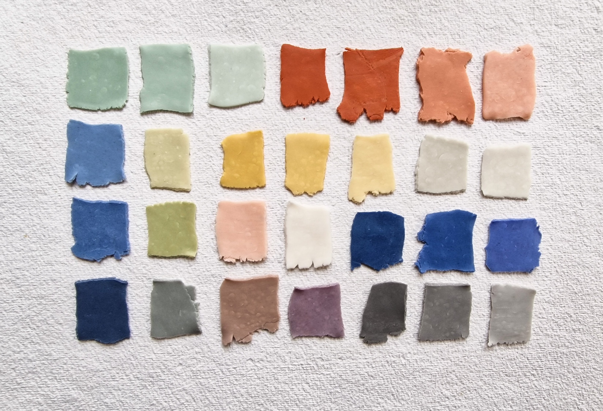 Colour swatches made from polymer clay and artists powdered pigments after baking
