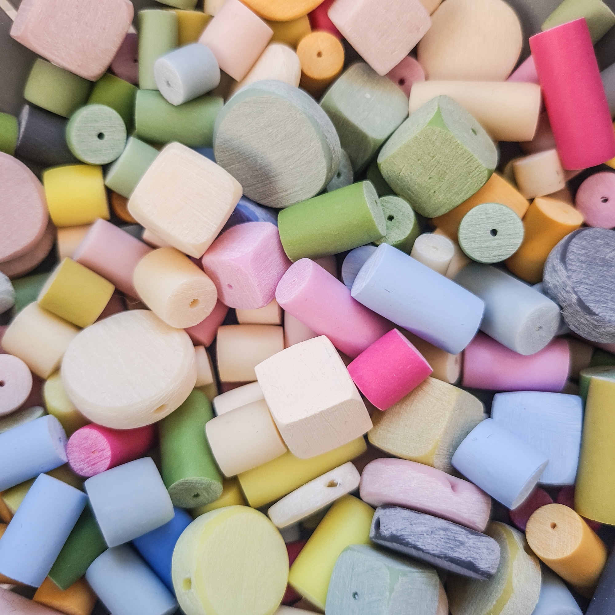 Candy coloured handmade polymer clay beads coloured with artists pigments