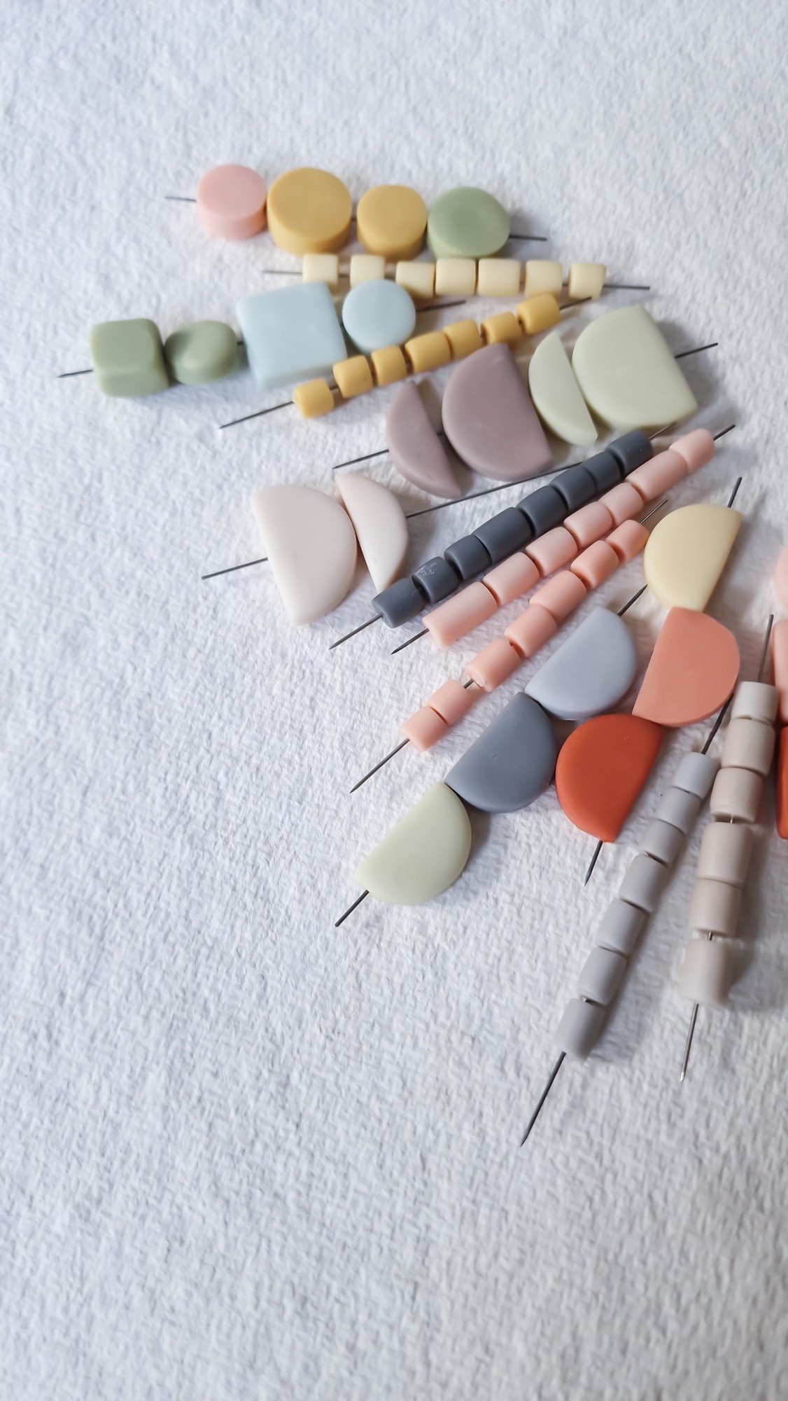 Handmade polymer clay beads made from ochre pigments