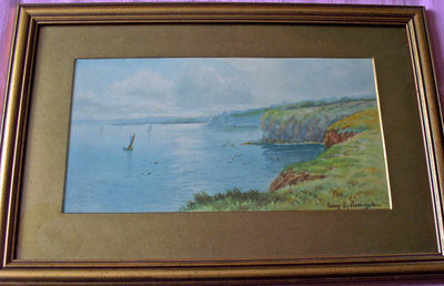 A COASTAL SCENE WITH BOATS, WATERCOLOUR SIGNED BY GEORGE OYSTON 1916 FRAME
