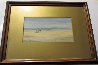 Camel train leaving the desert town, watercolour on paper, signed Jamrack,