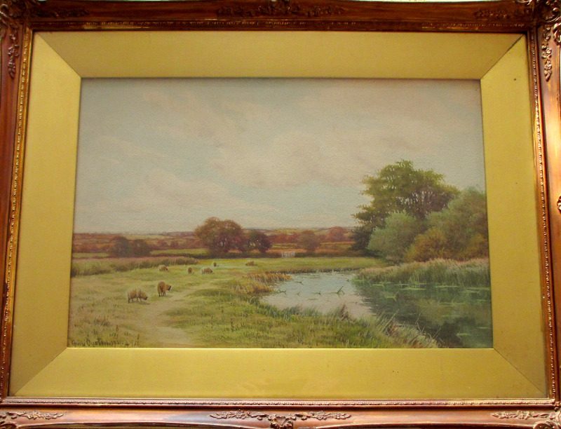 River Landscape with Grazing Sheep, watercolour on paper, signed George Oyston 1921.
