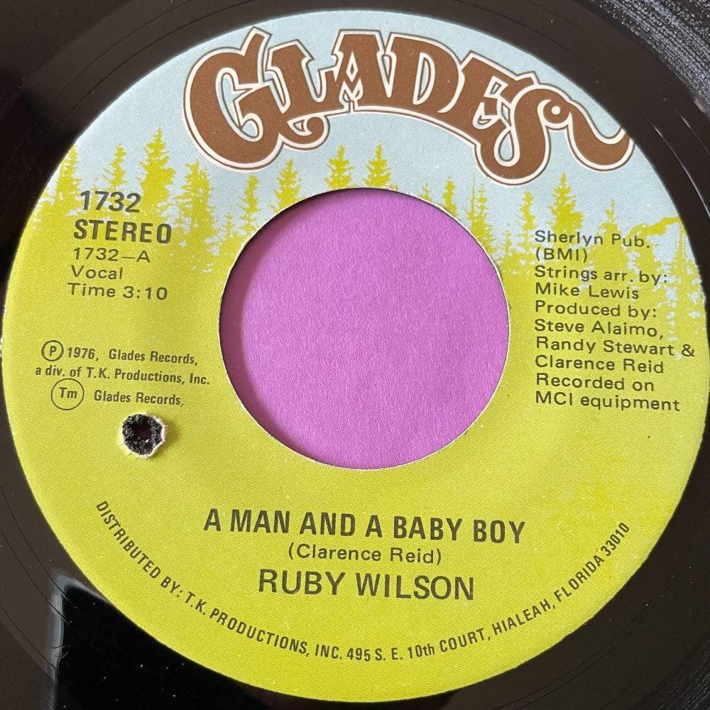 Ruby Wilson-A man and a baby boy-Glades E+