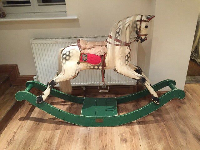 Rocking Horse Works Ex Carved On Green Bow