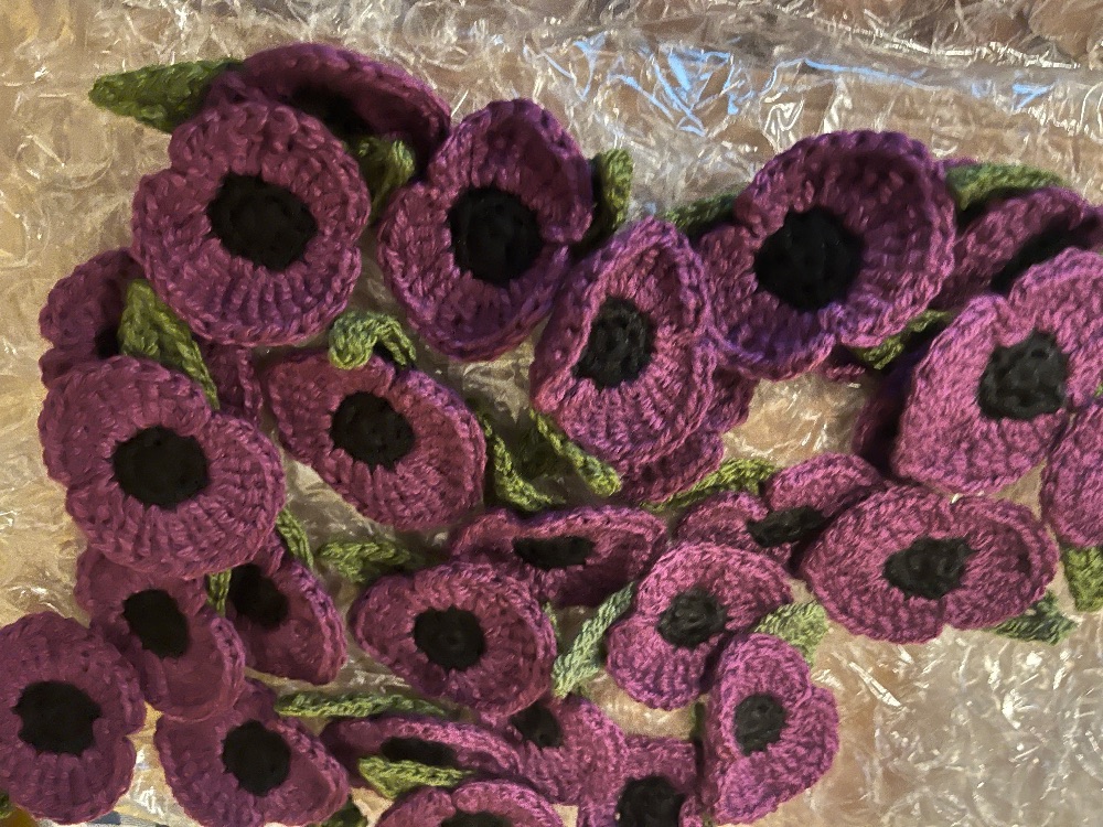 Purple poppy badges