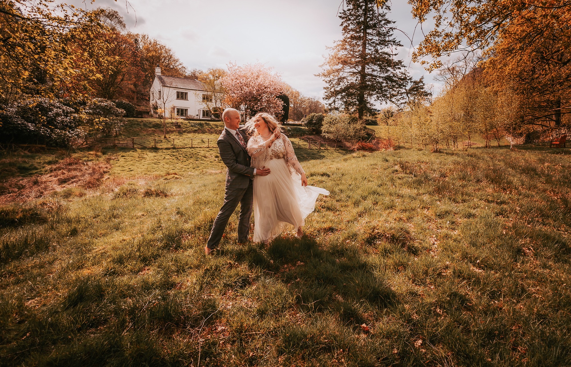 Bride and Groom enjoy the paddock with Cote How in the background