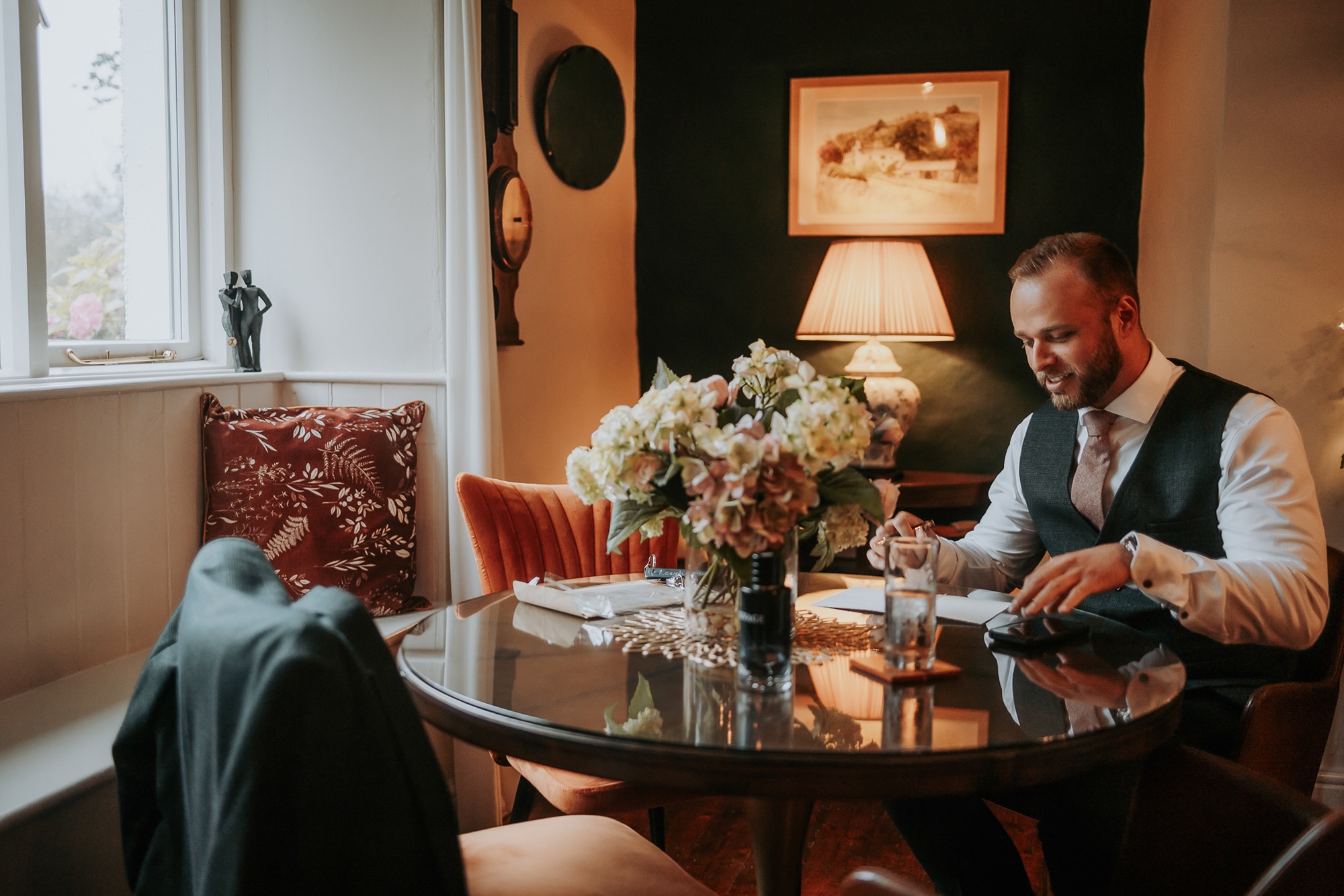 Groom writing his vows moments before his elopement at Cote How, Ambleside