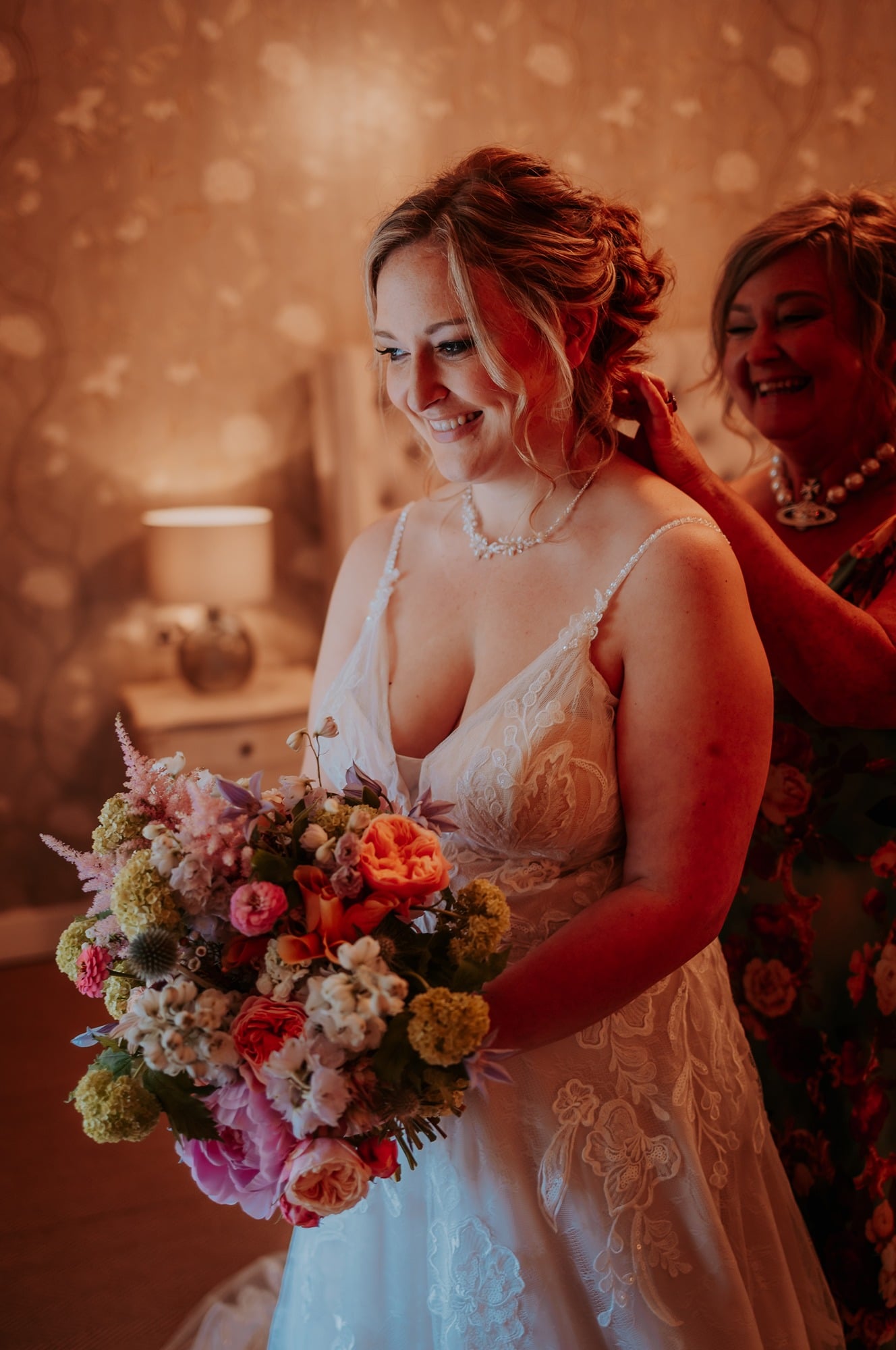 Bride getting final touches ahead of saying her vows in Town Head Estate rustic barn