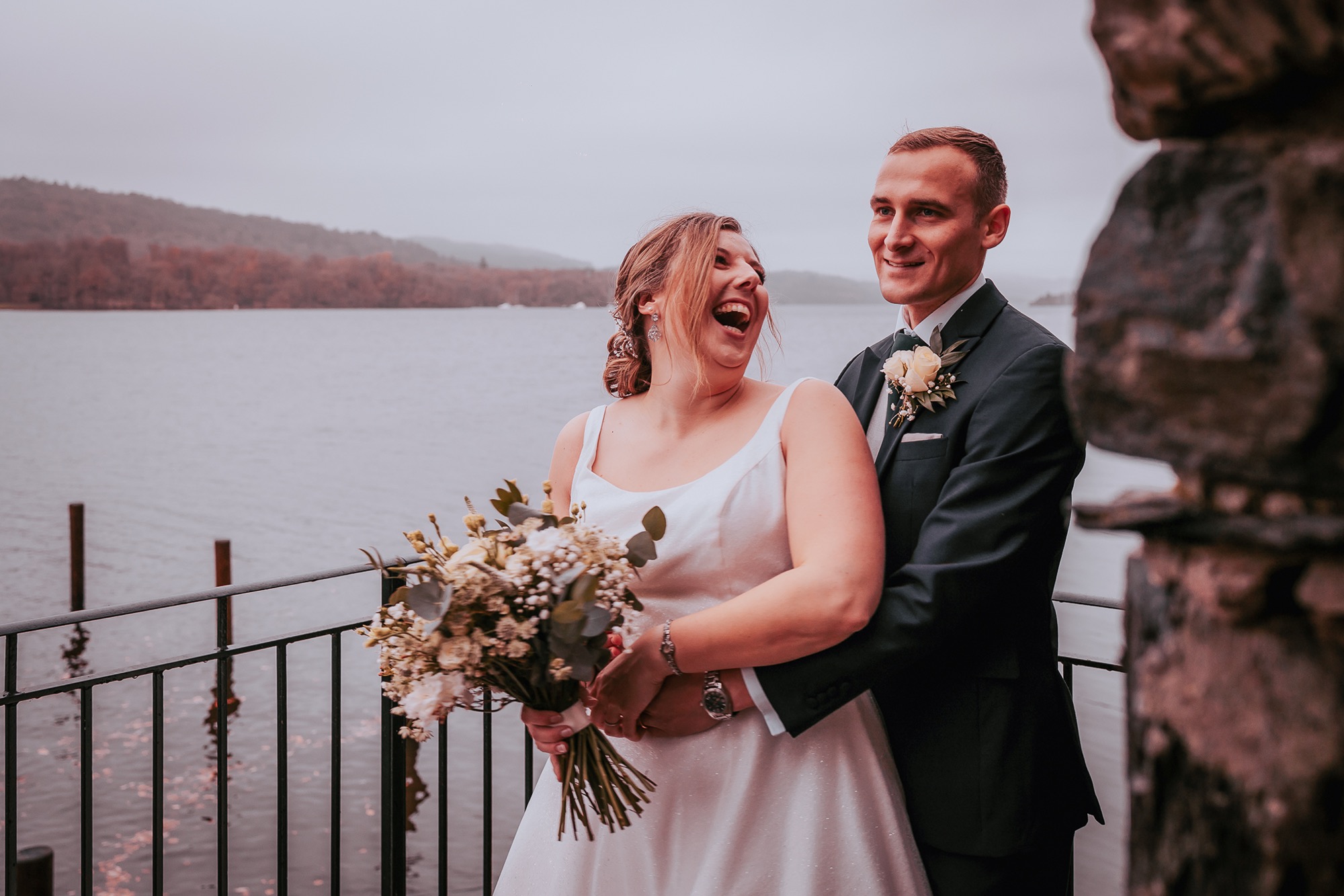 Couple enjoying a moment near Windermere lake