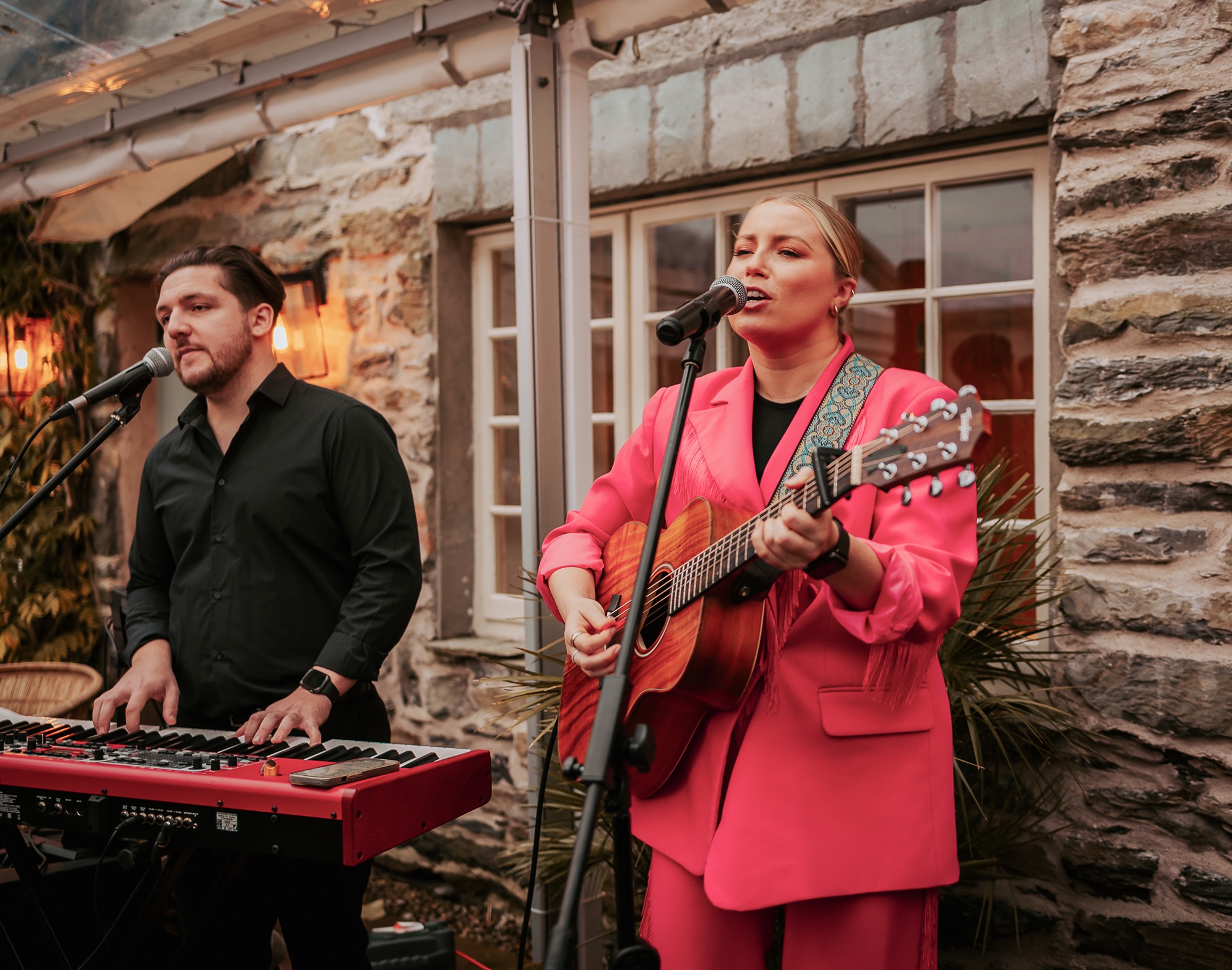 singer performing at Town head estate for wedding guests