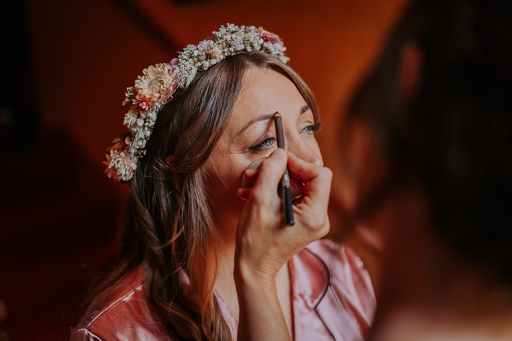 bride having her make-up done