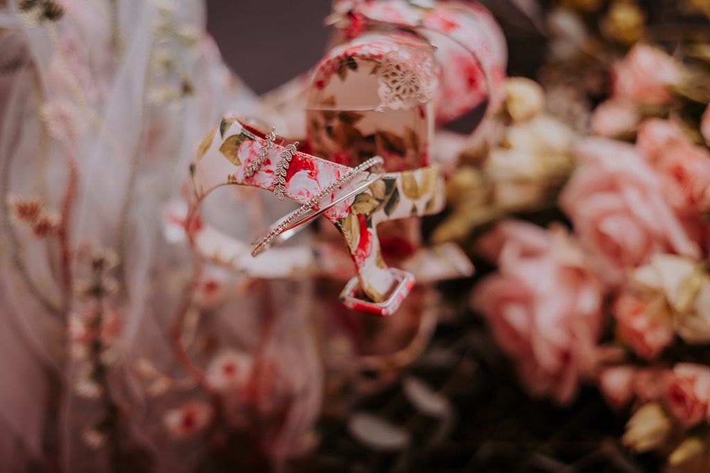 wedding jewellery displayed in floral pink wedding shoes
