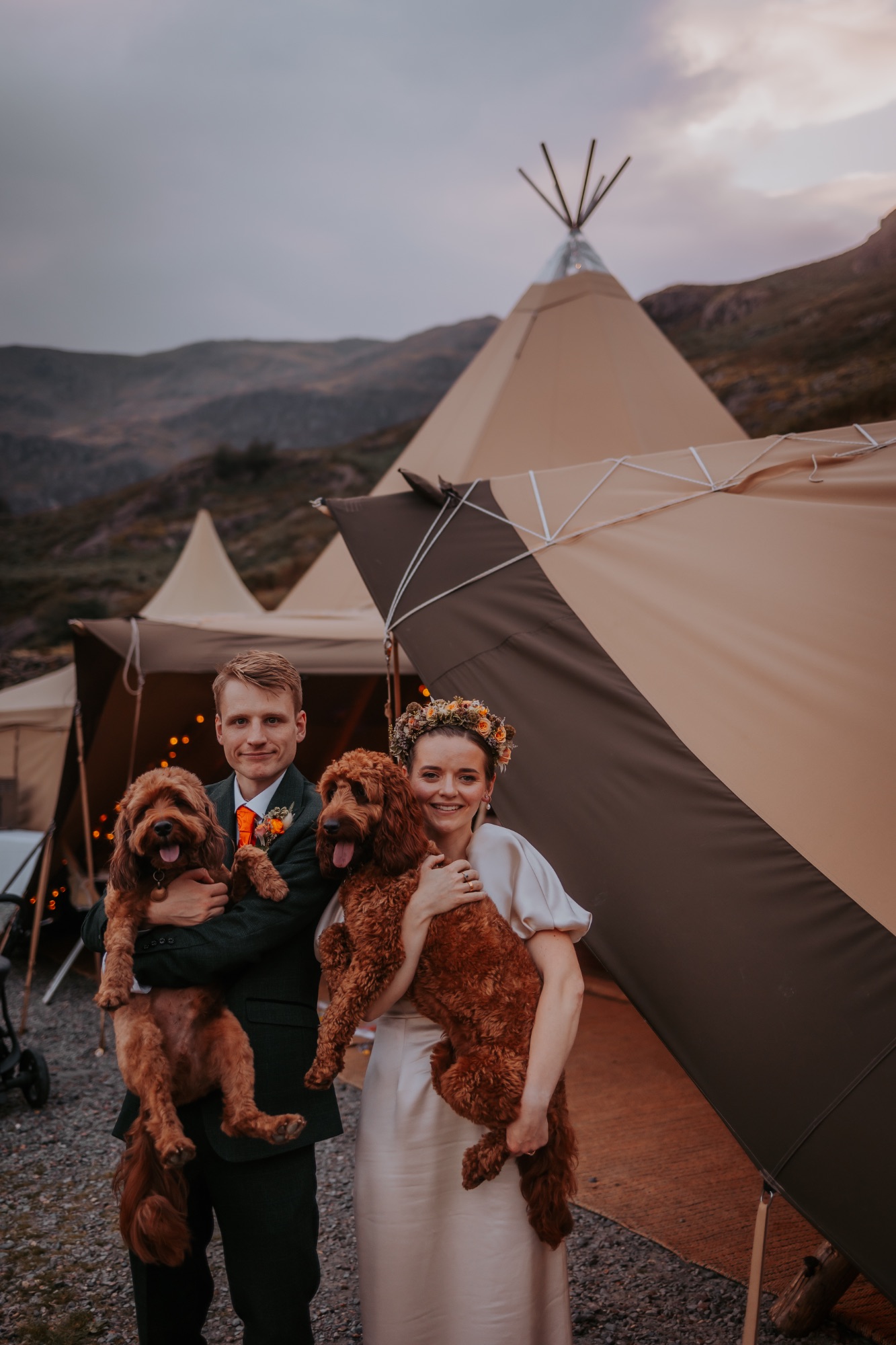 Border cline at food of bride and groom during colourful barn wedding ceremony