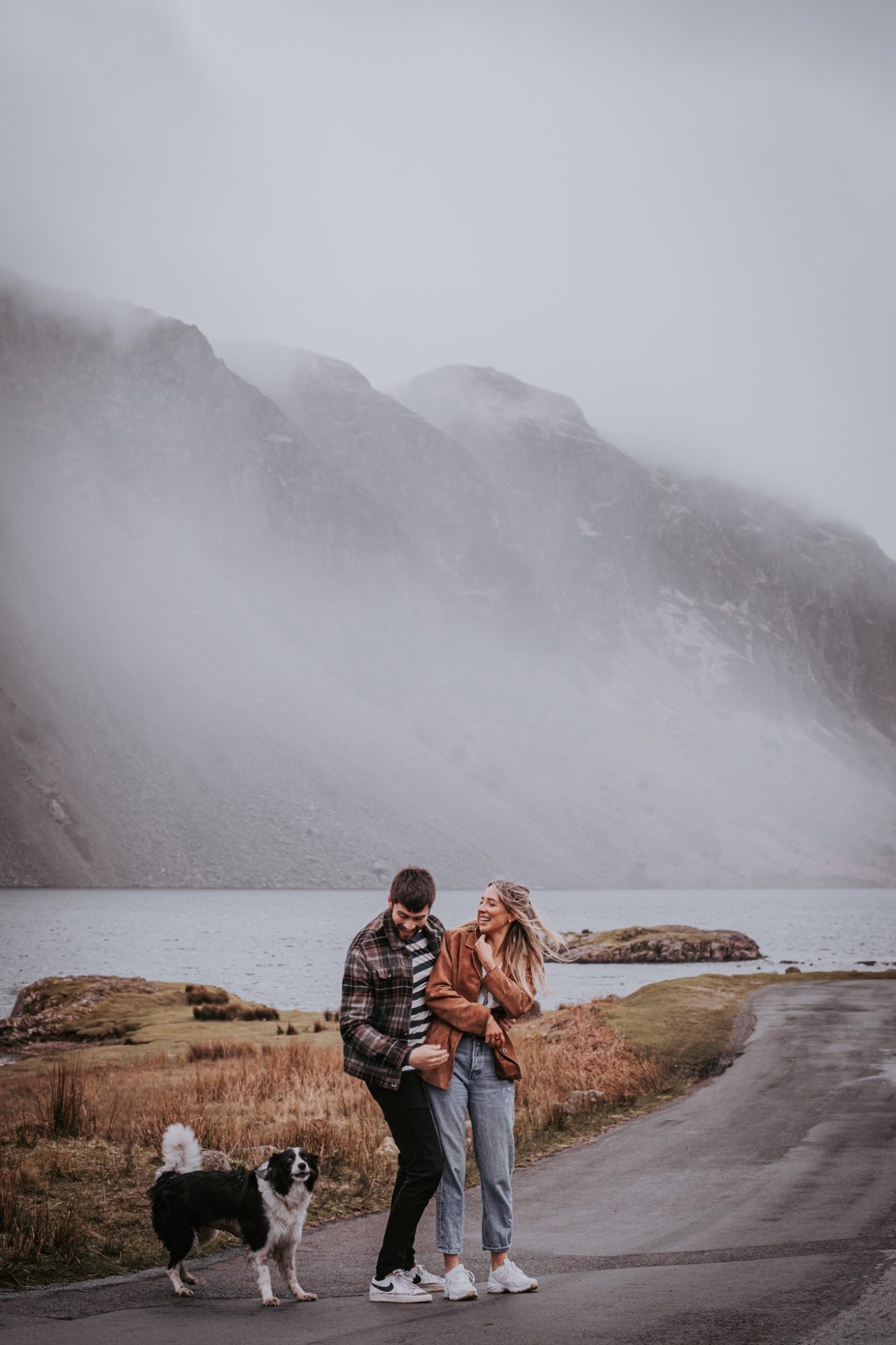 Pre-wedding portrait with border collie In the Lake District