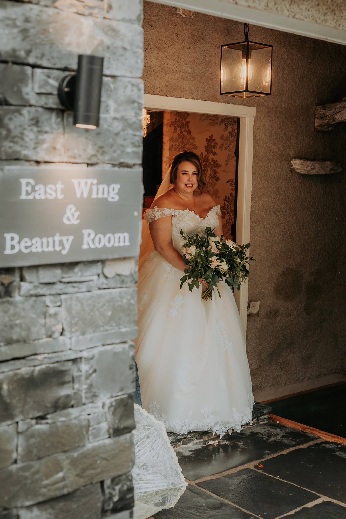 Bride coming out of bridal suit at Town Head Estate