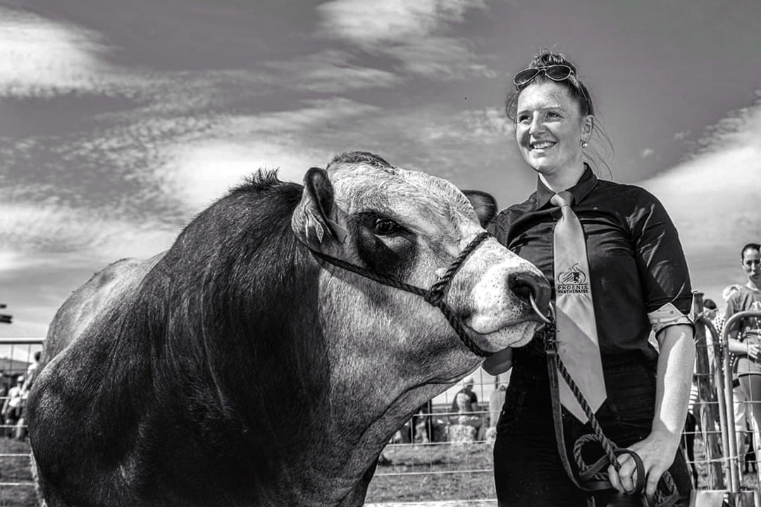 Award winning business woman with prize Parthenaise Bull 
