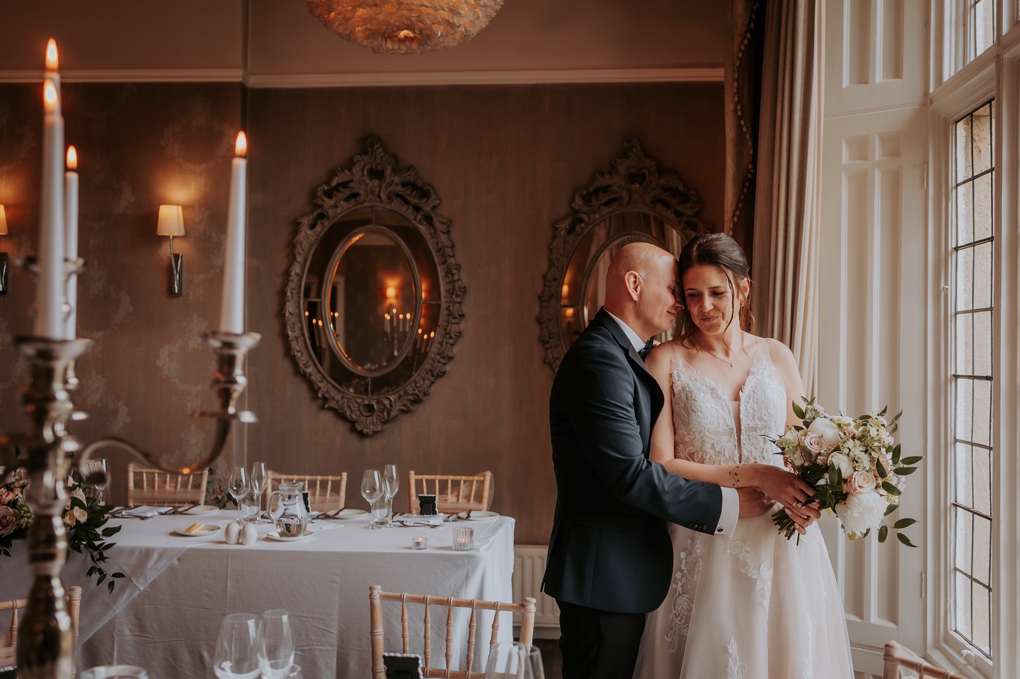 wedding couple romancing near a window at Falcon Manor, Settle, North Yorkshire