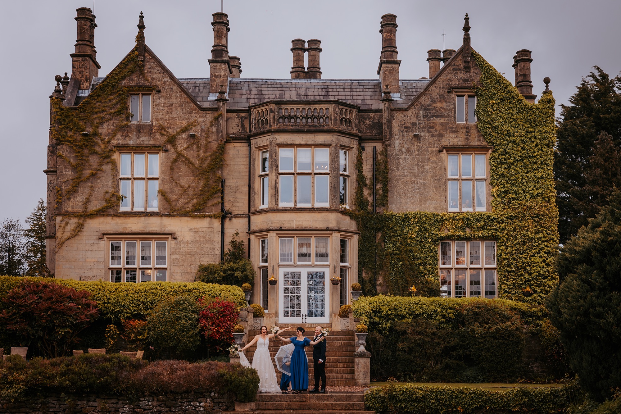 Bride, Groom and guests being sullying during portraits on their wedding day