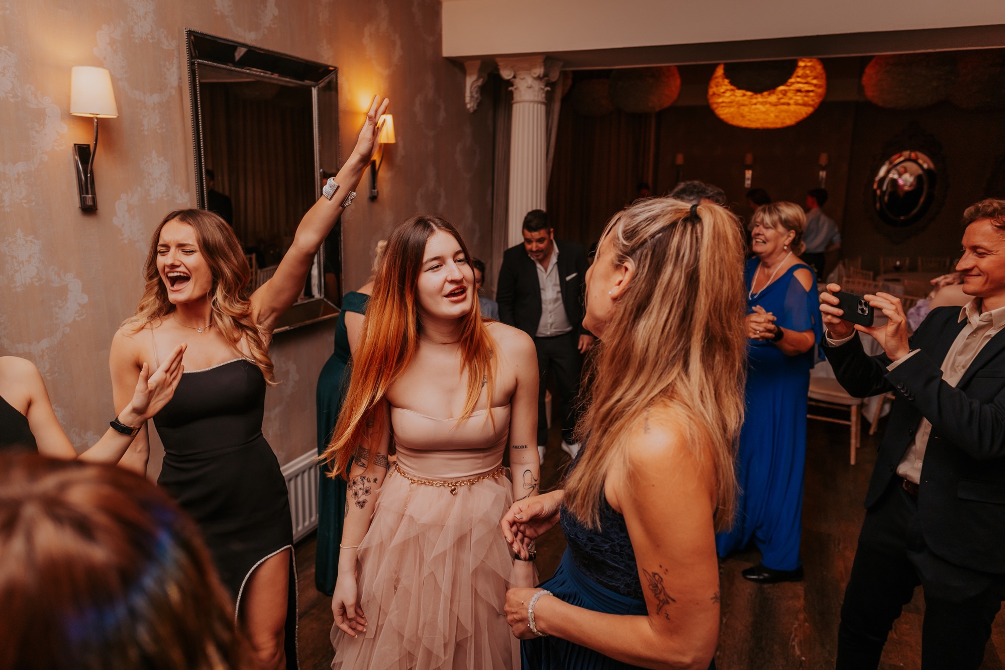 Wedding guests partying at wedding, Falcon Manor, North Yorkshire, Clare Gelderd Photography