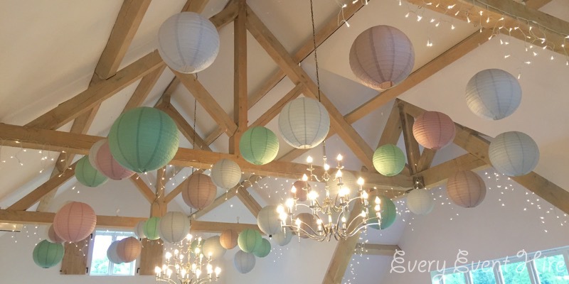 Lighting and hanging lantersn at Hyde House, Gloucestershire