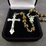 Brown wooden carved rosary in black flock gift box 50cm length